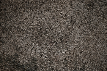 Asphalt background texture with some fine grain with road