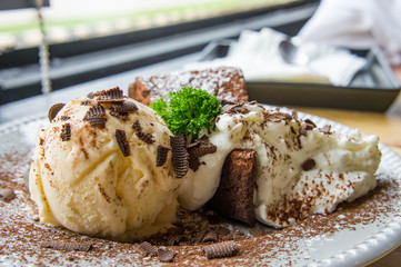 ice cream Vanilla chocolate pie whippin creamy tasty dessert on wood table in cafe ready to eat in restaurant.