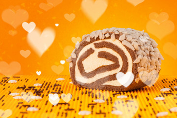 Delicious party cakes with heart shape symbols on colorful background