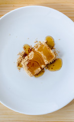 Tsukushi Mochi: Japanese dessert on white dish
