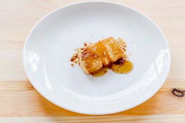 Tsukushi Mochi: Japanese dessert on white dish