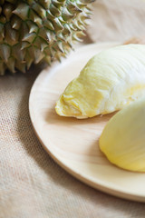 Fresh durian on wood dish