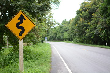 Curved road sign