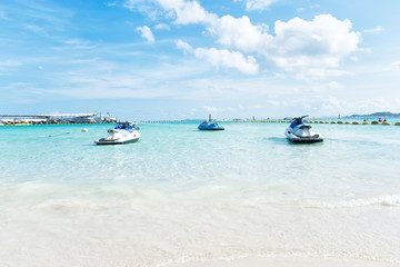 Blue sea and a jet ski floating on the sea, 