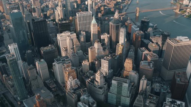 Wide angle aerial shot of New York around 6pm in the summer with magnificent view of city skyscrapers