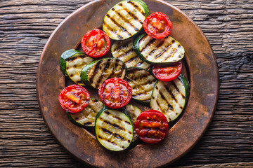 Griledl seasonal vegetable tomatoes and zucchini. Grill food