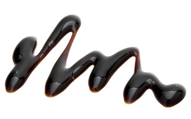 Obraz premium Balsamic vinegar cream isolated on white background. Italian salad dressing, sauce.