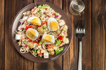 Fresh salad with couscous and eggs