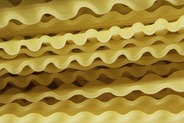 Uncooked spaghetti on table