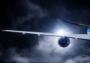 Airliner in sky. Mixed media