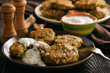 Turkey fritters with broccoli and leek , with garlic yogurt dip.