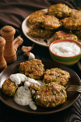 Turkey fritters with broccoli and leek , with garlic yogurt dip.