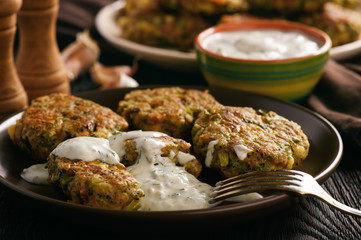 Turkey fritters with broccoli and leek , with garlic yogurt dip.