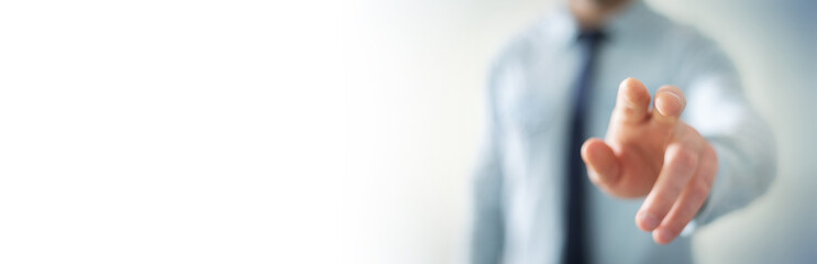 Obraz premium Panorama view of businessman pointing finger