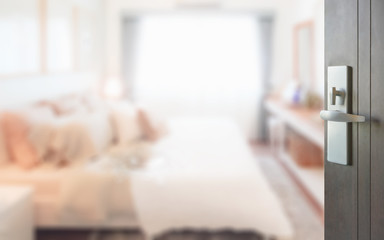 opened wooden door to modern style interior bedroom as background