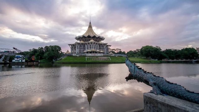 SARAWAK - JUNE 27: A 4K footage of beautiful sunrise with the background view of Sarawak State Legislative Assembly and Waterfront on June 27, 2017 in Sarawak.
