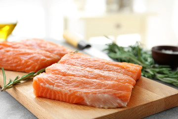 Fresh salmon fillet on wooden board