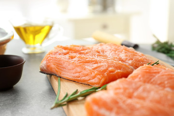 Fresh salmon fillet on wooden board