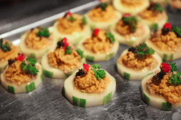 Tasty snack on metal tray