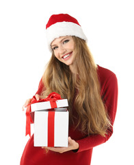 Beautiful lady in Christmas hat opening gift box against white background