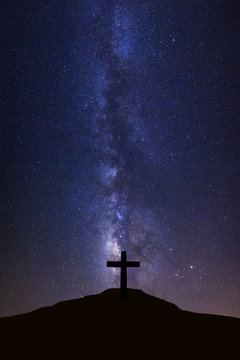 Fototapeta Silhouette of cross and milky way galaxy, Night sky with stars and space dust in universe