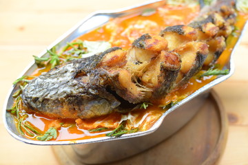 Sour soup made of tamarind paste with walking catfish