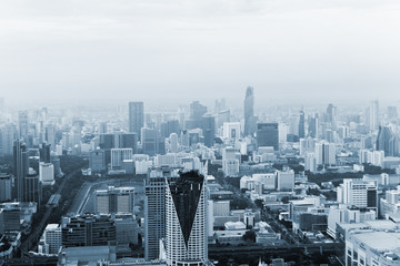 Naklejka na ściany i meble Bangkok cityscape high panorama. High view of buildings, river and traffic.