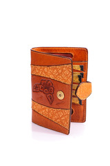 One purse, genuine leather with embossing ,black brown colors,Fashionable men's accessory To store money on a white background