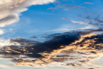 colorful dramatic sky with cloud at sunset.