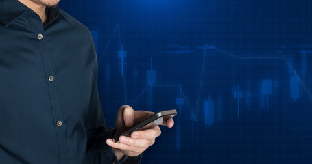 Businessman using smart phone on Stock market financial analysis indicator background