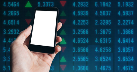 Close up of Businessman hand holding smart phone with Blank White Screen on Stock market financial analysis indicator background