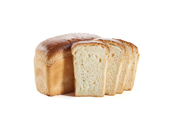 Slices of delicious fresh bread placed near the loaf isolated on white. 