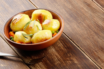 Boiled and baked potato and vegetables