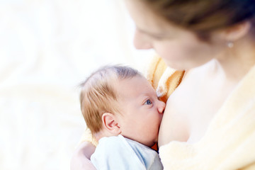 Fototapeta na wymiar Mother breastfeeding her baby