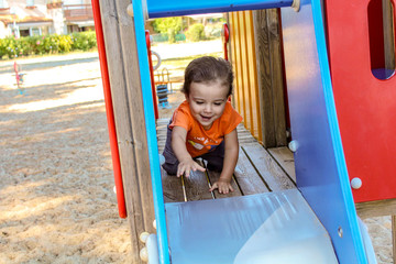 Fototapeta na wymiar a boy play at the kids park