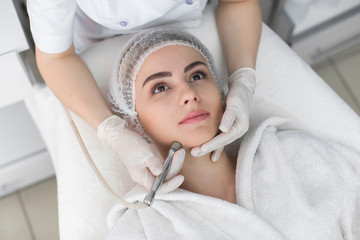 Face Skin Care. Close-up Of Woman Getting Facial Hydro Microdermabrasion Peeling Treatment At Cosmetic Beauty Spa Clinic. Hydra Vacuum Cleaner. Exfoliation, Rejuvenation And Hydratation. Cosmetology.