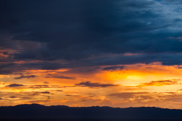 colorful dramatic sky with cloud at sunset