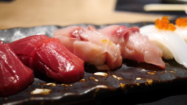 soft focus sushi closeup / Salmon Tuna Hamaji and Squid