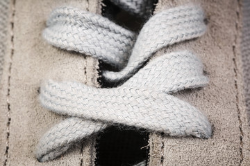 Pair of men's sports shoes close up background