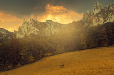 Naklejka na ściany i meble Cloudy and sunny sunset with sun ray, Strazovske mountains, Slovakia