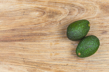 avocado on a dark wood background. tinting. selective focus