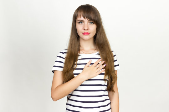 Woman  Making An Oath With Hand On Heart And Chest