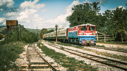 Naklejka premium The train from Hsipaw passing Goteik Viaduct and stop at Goteik station.
