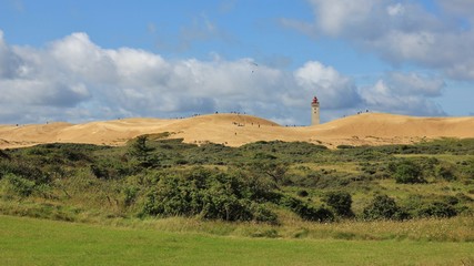90 meter high sand dune and lighthouse at the west coast of Denmark. Rubjerg Knude.