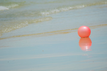 beach ball on beach sand