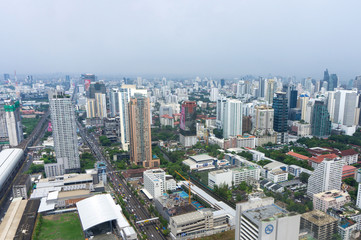 Fototapeta premium bangkok city and modern office buildings in Aerial view