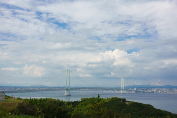 view of Akashi-kaikyo ohashi bridge from Awaji Servise area at highway in Hyogo, Japan