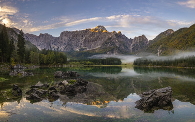Fototapeta na wymiar Mountain lake in the Julian Alps in Italy