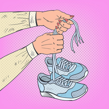 Pop Art Woman Hands Holding Running Shoes. Sneakers Footwear. Vector illustration