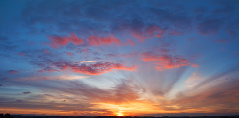 Fototapeta na wymiar Natural Sunset Sunrise. Bright Dramatic Sky